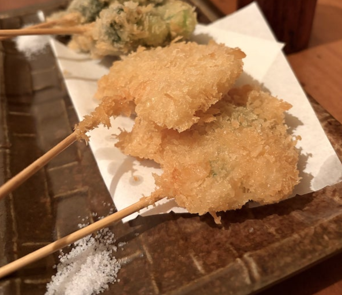 A small kushikatsu izakaya in Yutenji, Tokyo. A retro local spot serving simple, delicious deep-fried skewers.