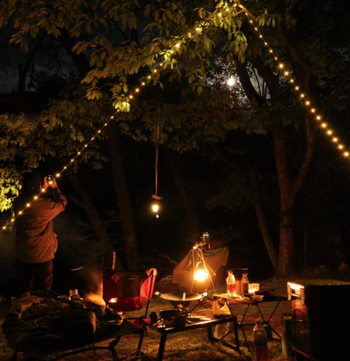 Campsite at Ojiragawa Valley in Hakushu, surrounded by clear river and forest in Hokuto City, Yamanashi, Japan